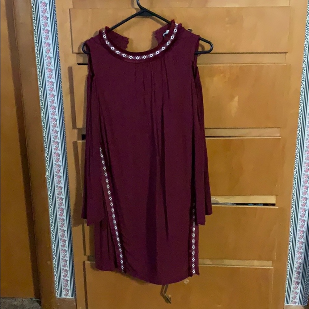 dress with cut long sleeves.